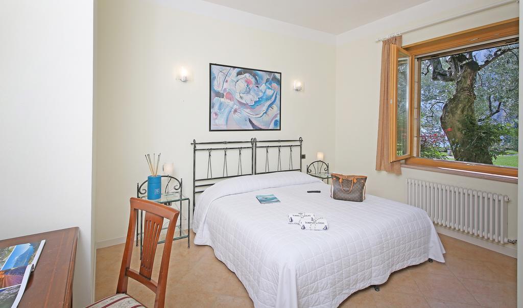 ティニャーレ Torre Degli Ulivi Bed & Breakfast エクステリア 写真